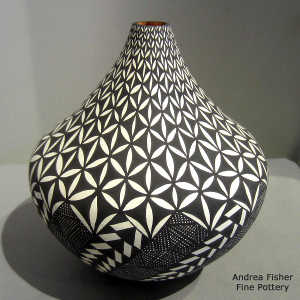 Geometric design on a black and white tear drop jar