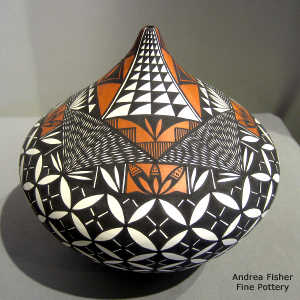 Geometric design on a polyhrome tear drop jar