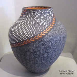 Checkrboard, fine line and geometric design on a polychrome jar