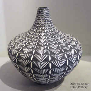 Geometric design on a black and white tear drop jar