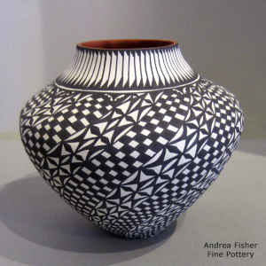 Checkerboard and geometric design on a polychrome jar