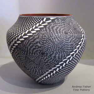 Geometric design on a black and white tear drop jar