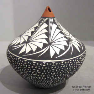Geometric design on a polychrome tear drop jar
