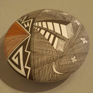 Fine line and geometric design on a polychrome seed pot