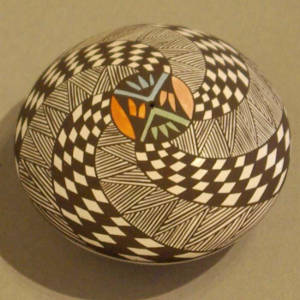 Geometric design on a polychrome seed pot