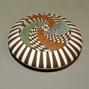 Geometric design on a polychrome seed pot