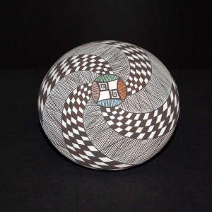 Fine line and geometric design on a polychrome seed pot