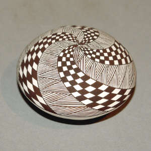 Swirl fine line and geometric design on a black and white seed pot