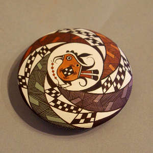 Parrot, fine line and geometric design on a polychrome seed pot