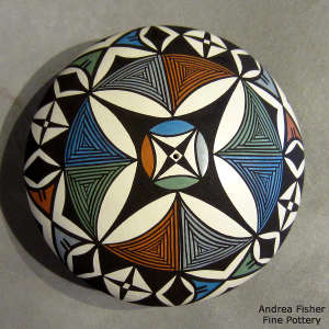 Geometric design on a polychrome seed pot