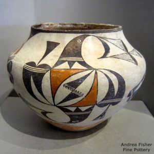 Cloud, rain, bird element, kiva step and geometric design on a polychrome jar