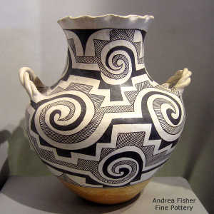 Rain, kiva step, Tularosa spiral and geometric design on a polychrome jar with a pie crust rim and twisted handles