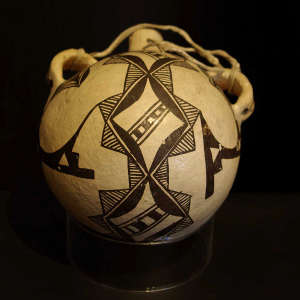 Geometric design on a black and white canteen