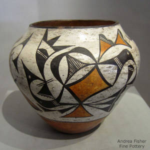 Bird element and geometric designs on a polychrome jar