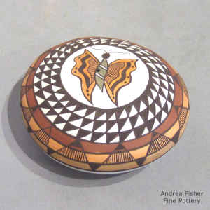 Butterfly and geometric design on a miniature polychrome seed pot