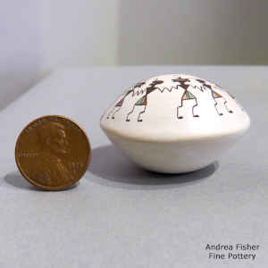 Mimbres dancers, feathers, fine line and geometric design on a miniature polychrome seed pot