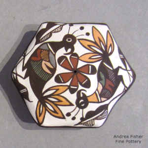 Parrot, fine line and geometric design on a miniature hexagonal polychrome seed pot