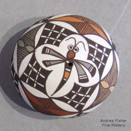 Dragonfly, fine line and geometric design on a miniature polychrome seed pot