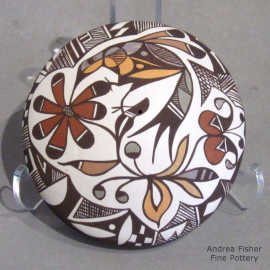 Bird, floral and geometric design on a miniature polychrome seed pot