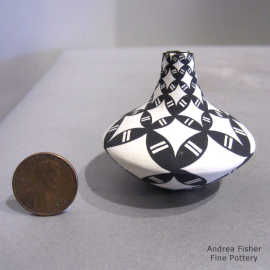 Geometric design on a miniature black-on-white tear drop jar