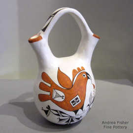 Parrot, branch and geometric design on a polychrome wedding vase