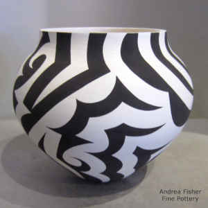 Tattoo geometric design on a black and white jar