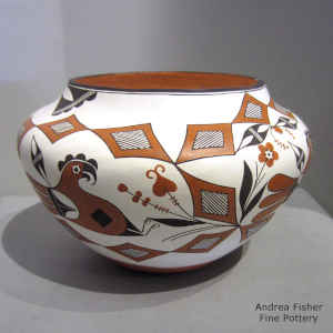 Parrot, branch, rain and geometric design on a polychrome jar