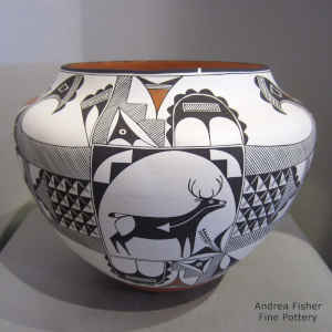 Deer, heart line and geometric design on a polychrome jar