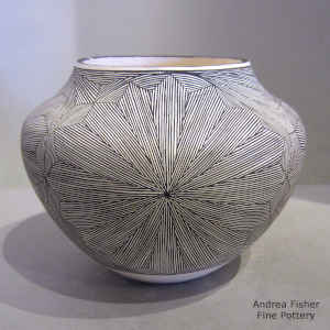Black and white jar with a snowflake fine line design