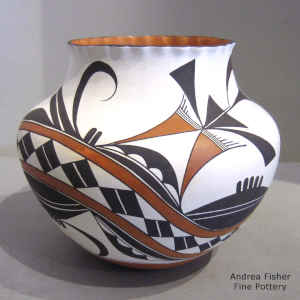 Rainbow, cloud and geometric design on a polychrome jar
