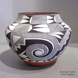 Black and white spiral, rain, kiva step and geometric design on a polychrome jar