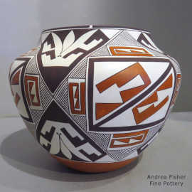 Polychrome jar with rain, cloud and geometric design