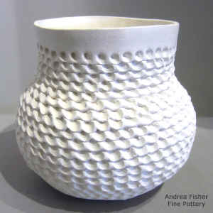 Corrugated surface on a white jar