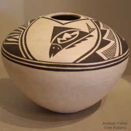 Black-on-white seed pot with a fish, fine line, lightbning bolt and geometric design