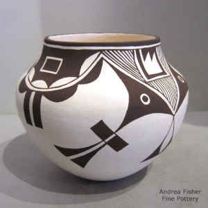 Rain, clouds and geometric design on a black-on-white jar