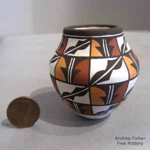 Miniature polychrome jar with a geometric design