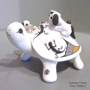 1 child, puppies, birds and butterfly on a turtle