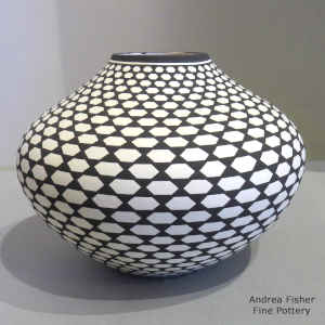 Geometric design on a black and white jar