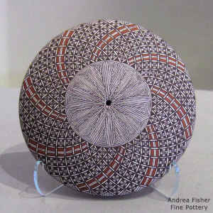 North Star fine line and geometric design on a polychrome seed pot