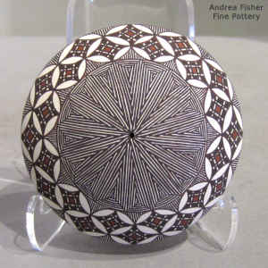 North Star fine line and geometric design on a miniature black and white seed pot