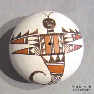 Stylized Mimbres-style flying insect and a geometric design on a miniature polychrome seed pot