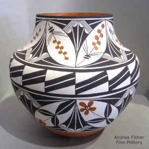 Flower and geometric design on a polychrome jar