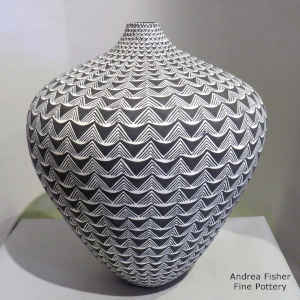 Geometric design on a black and white tear drop jar