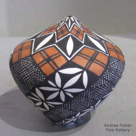 Spiral fine line and geometric design on a polychrome tear drop jar