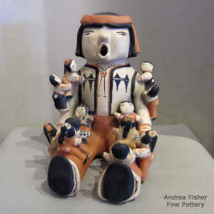 Grandfather storyteller figure with 12 children