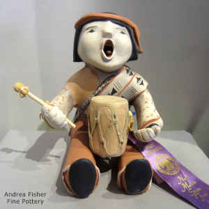 Singing grandfather drummer figure
