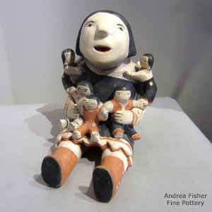 Five children on a grandmother storyteller