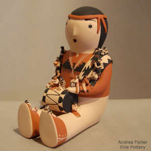 Eighteen children and a drum on a grandfather storyteller