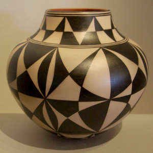 Black and white geometric design on a polychrome storage jar