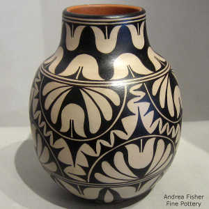 Black and white geometric design on a polychrome jar